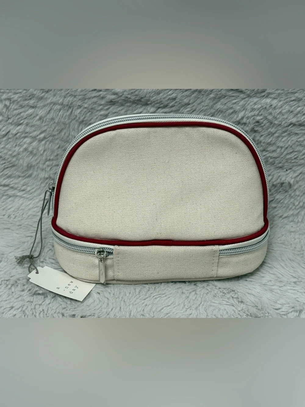 a new day Cream Cosmetic Pouch with Red Trim